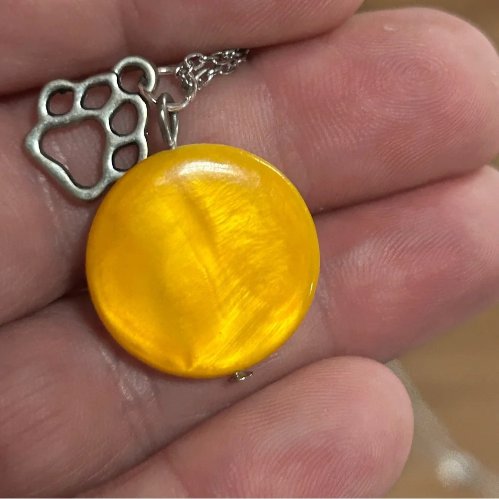 Handcrafted mustard yellow mother of pearl paw charm pendant on chain necklace